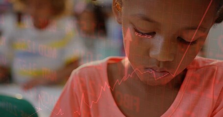 Concentrating girl wearing pink shirt writing paper at school desk with red arrow chart overlay