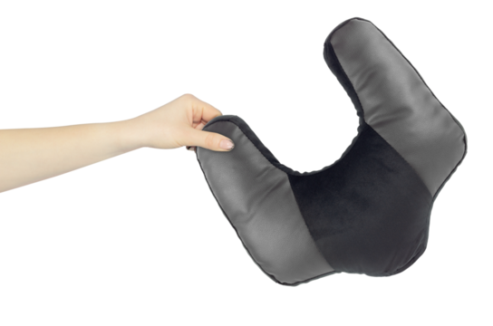 Neck pillow in hand, outstretched arm with neck pillow, isolated from background