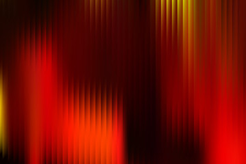 Abstract vertical lines in red, yellow, and black create a fiery and dynamic pattern, perfect for backgrounds and graphic design projects with a bold feel