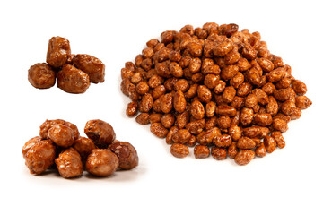 Tasty sweet roasted peanuts isolated on a white background.