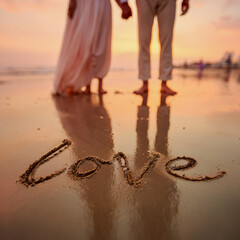 Close-Up Romantic Couple on Wet Reflective Sand with Pastel Peach Sky – perfect for love-themed posters