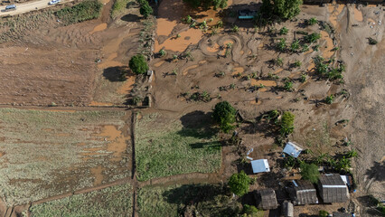 Aerial view of local house in Karen Ruammit Elephant Camp village in Chiang Rai province of Thailand flooded by Kok river after heavy raining.
