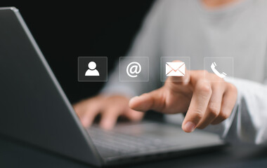 Contact us concept. Online customer service. Person using smartphone with contact us icon or Customer support hotline people connect.