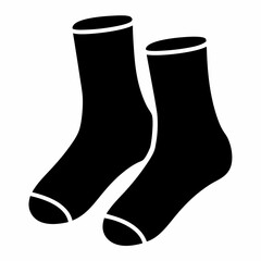 Two simple black socks on a white background for keeping feet warm
