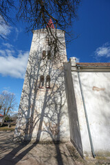 Kandava Lutheran Church Tower Against a Clear Blue Sky in Latvia