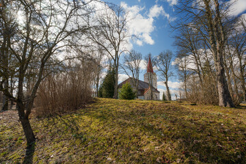 Kandava Lutheran Church Tower Against a Clear Blue Sky in Latvia