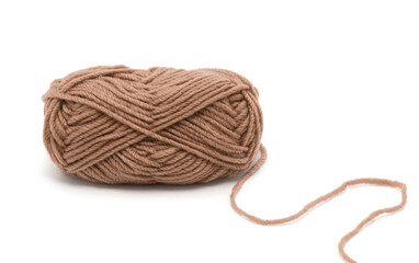 Brown knitting yarn isolated on white