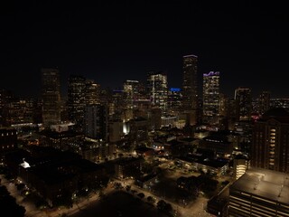 Beautiful Houston Texas skyline at night with a stunning aerial drone view 4K downtown