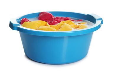 Plastic basin with clothes and water isolated on white
