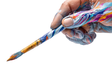 A hand holding a paintbrush covered in colorful paint