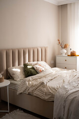 serene autumn bedroom with decor, cozy and serene autumn bedroom interior with textiles