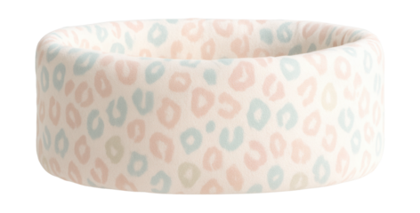 Pastel animal print crib bumper in soft fabric for a cozy nursery.