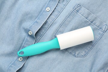 Sticky lint roller on shirt, top view