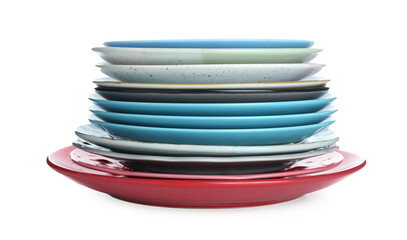 Stack of colorful ceramic plates isolated on white