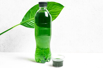 Liquid Chlorophyll Drink. Bottle of Green Chrorophyll Water.