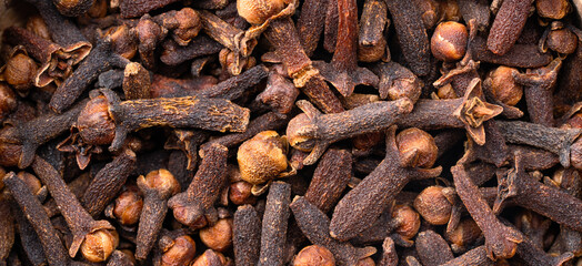 Dried cloves  spice  isolated on black background. 