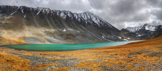 Russia. Altai Mountains. Panorama of the mountain lake Karaköl.