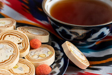 Uzbek Halva with Pistachios on Traditional Ceramic Plate