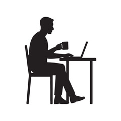 Silhouette of a person sitting at a desk and working on a laptop