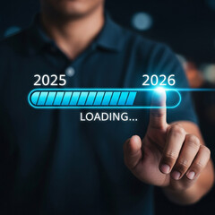 Man s finger touches loading bar transitioning from 2025 to 2026