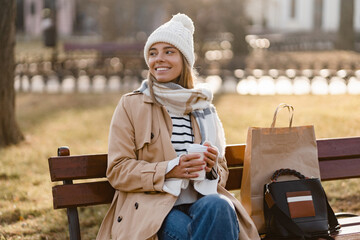 stylish woman walking in winter street