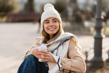 stylish woman walking in winter street