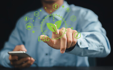 ESG icon with green energy, CO2, recycling, and mobility symbols on virtual interface. Concept of digital ESG strategy, environmental responsibility, and sustainability tech.