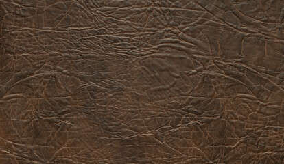 Brown imitation leather background. Imitation leather surface. Brown imitation leather texture. Close up.