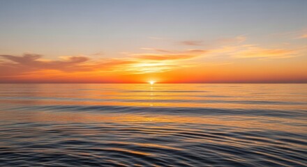 Fototapeta premium Golden Sunset Over Calm Ocean Water Horizon