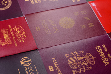 Fototapeta premium A background of several passports from different countries, an international ID card. Passport