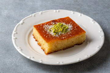 Revani - sweet semolina cake with pistachio, traditional turkish dessert