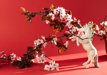 White horse with plum flowers around it, celebration of the Chinese New Year 2026