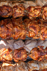 Cedrillas Teruel Spain Exhibition of animals and food at the Cedrillas livestock and agricultural fair. Chickens roasting in a rotisserie.