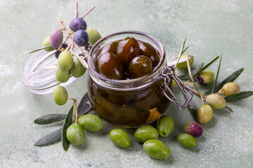 Olive jam in a glass bowl.