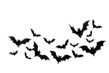 A swarm of dark bats in flight against a black background