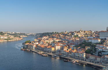 Obraz premium View of Porto city Ribeira District and Douro river. Portugal. Sunrise Light