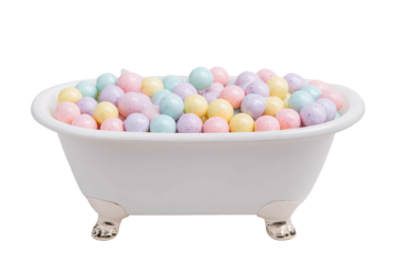 Pastel-colored balls in a white bathtub