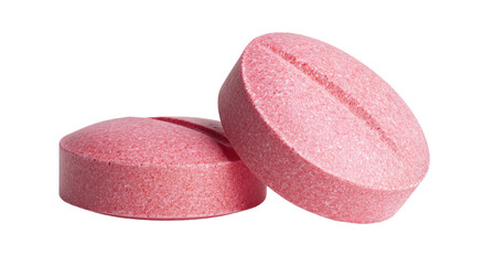 Two pink pills on a white background