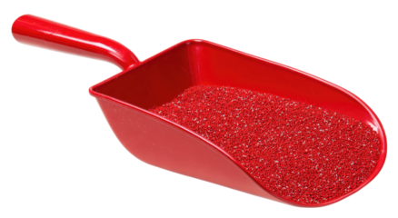 Red plastic scoop filled with small red granules (1)