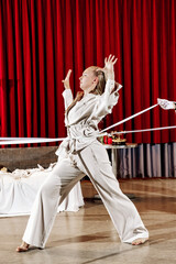 A theater actress in a play role on stage.
