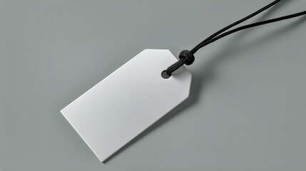 Blank Hanging Tag on Gray Background Ready for Customization or Labeling