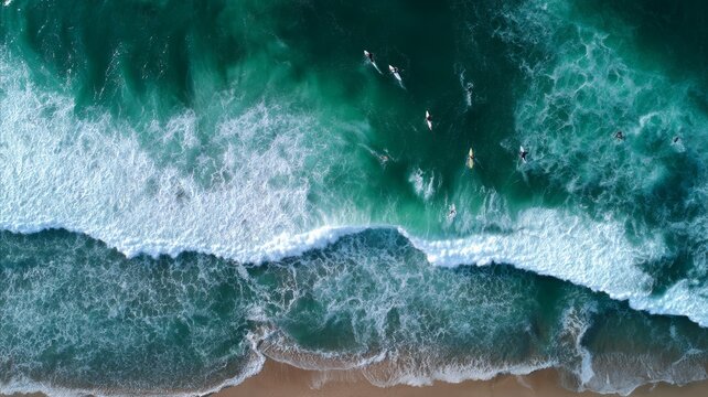 Aerial view of surfers riding green ocean waves. AI image - Powered by Adobe