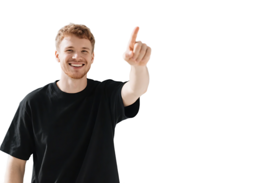 A young man wearing a black shirt is pointing his finger upwards with a smiling expression.