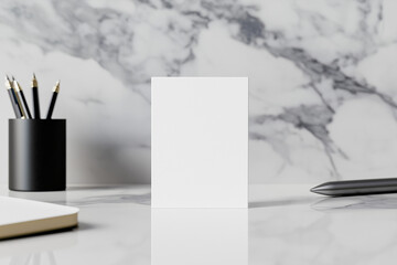 A vertical business card mockup standing upright against a sleek marble background, slightly tilted to show both sides, with modern office accessories. Generative AI