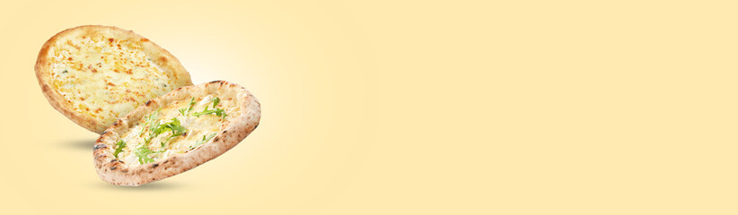 Different delicious pizzas with cheese in air on beige background. Banner design with space for text
