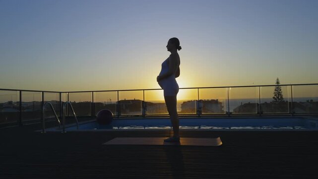 Prenatal Yoga Routine Rooftop Pool Dusk Ocean