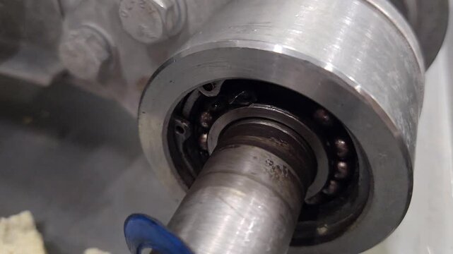 damaged bearing with a destroyed separator and partially lost balls