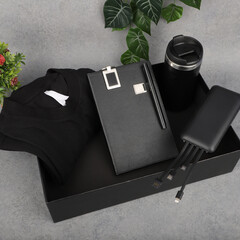 Black Office Essentials Set With Clipboard, Wallet, Cables, T-Shirt, Mug, And Plant Decor