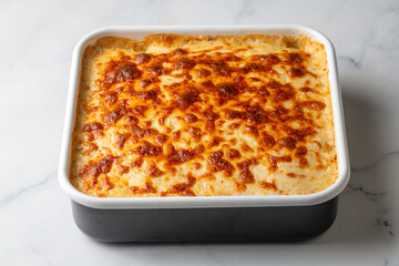 Traditional Greek potato and meat casserole with cheese - moussaka,