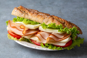 Cold sandwich with cheddar cheese and ham
